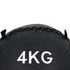 Black medicine ball with '4KG' marking on a white background