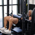 Person using a hip thrust machine in a gym setting