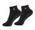 A pair of black low-cut ankle socks with a small gold, white, and black striped detail on the ribbed cuff, and a wavy gray grip pattern on the sole.
