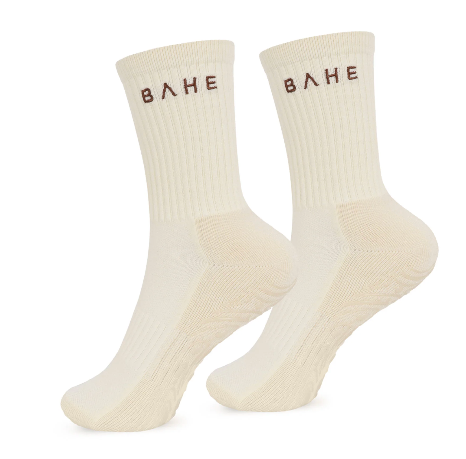 A pair of off-white crew socks with ribbed cuffs and the brand name 'BAHE' printed in dark brown on the front, shown against a plain white background.